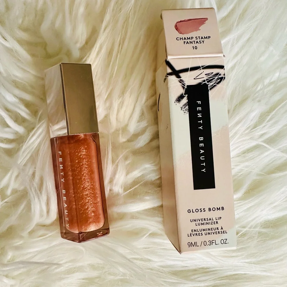 Fenty Beauty Gloss Bomb in Shimmering Gold Pearl Champ Stamp Fantasy